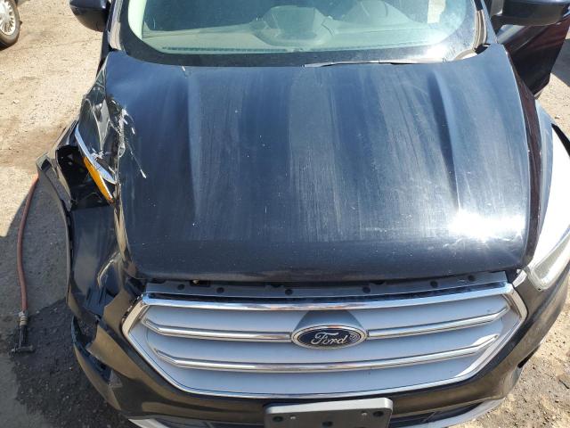 Photo 11 from auction – 2019 FORD ESCAPE SE with VIN 1FMCU9GD8KUB78776