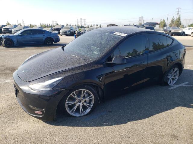 TESLA MODEL Y 2024 with VIN 7SAYGAEE2RF009101 - Photo from auction