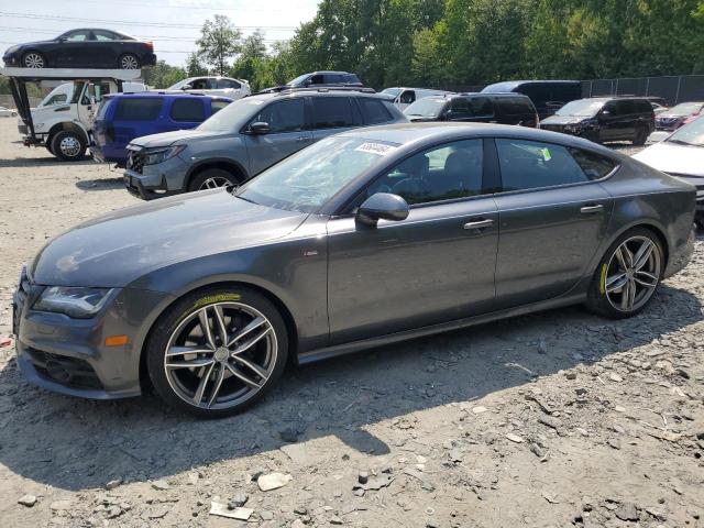 AUDI A7 PRESTIG 2015 with VIN WAU2MAFCXFN022679 - Photo from auction