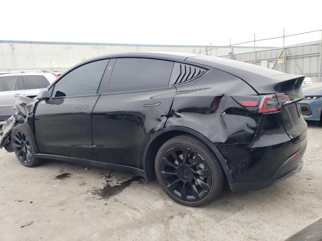 Photo 2 from auction – 2023 TESLA MODEL Y with VIN 7SAYGAEE6PF899504