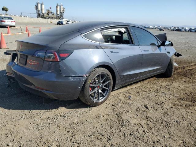 Photo 3 from auction – 2021 TESLA MODEL 3 with VIN 5YJ3E1EAXMF930226