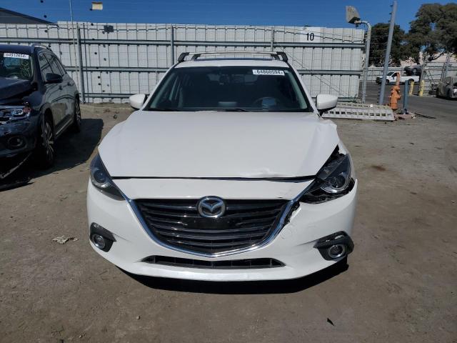 Photo 5 from auction – 2014 MAZDA 3 GRAND TO with VIN JM1BM1M3XE1102575