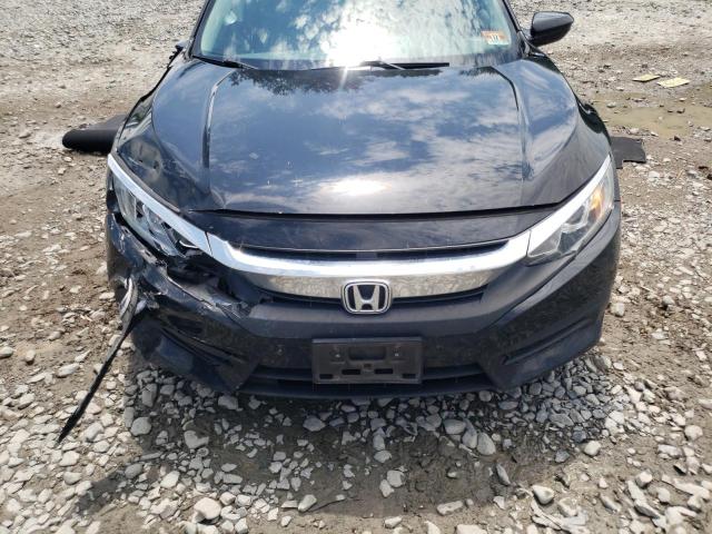 Photo 11 from auction – 2018 HONDA CIVIC LX with VIN 2HGFC2F53JH504170