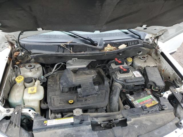 Photo 12 from auction – 2012 JEEP COMPASS SP with VIN 1C4NJDBB9CD558693