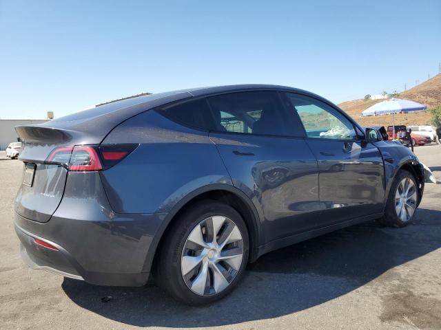 Photo 3 from auction – 2023 TESLA MODEL Y with VIN 7SAYGAEE4PF899677