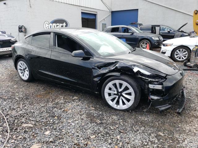 Photo 4 from auction – 2023 TESLA MODEL 3 with VIN 5YJ3E1EA2PF639353
