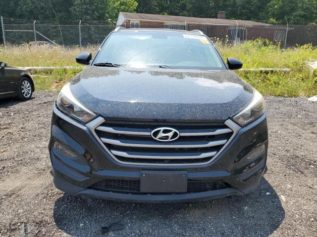 Photo 5 from auction – 2018 HYUNDAI TUCSON SEL with VIN KM8J3CA48JU637951