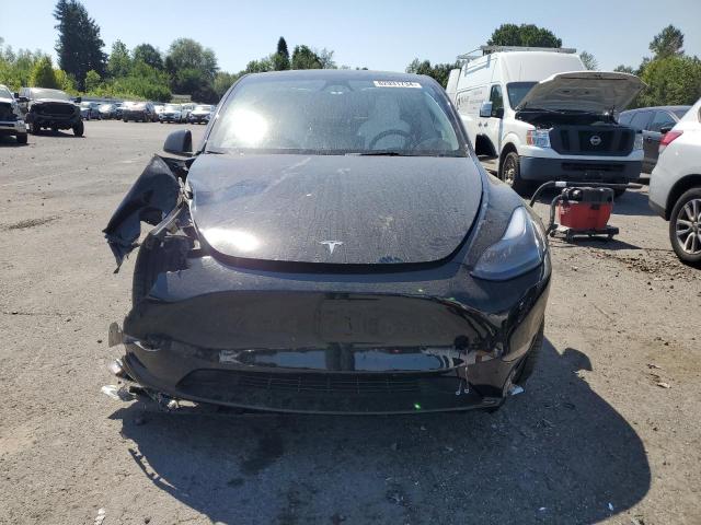 Photo 5 from auction – 2023 TESLA MODEL Y with VIN 7SAYGDEF2PF814121