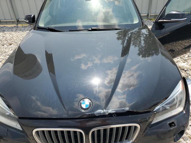 Photo 11 from auction – 2013 BMW X1 XDRIVE2 with VIN WBAVL1C52DVR84252