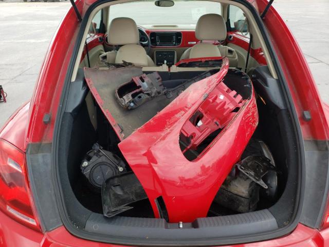 Photo 10 from auction – 2014 VOLKSWAGEN BEETLE with VIN 3VWJX7AT4EM629604