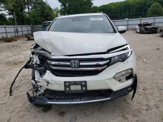 Photo 5 from auction – 2017 HONDA PILOT TOUR with VIN 5FNYF5H92HB029255