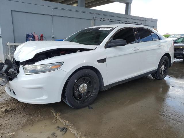 FORD TAURUS POL 2014 with VIN 1FAHP2L80EG156426 - Photo from auction