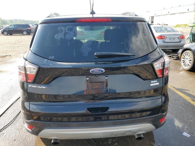 Photo 6 from auction – 2018 FORD ESCAPE SEL with VIN 1FMCU0HD2JUB82590