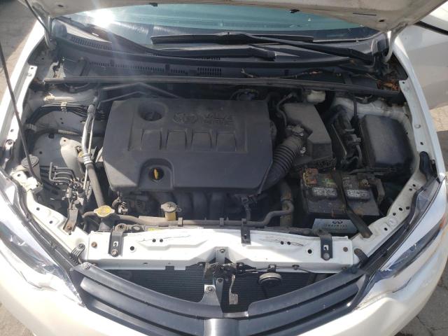 Photo 11 from auction – 2014 TOYOTA COROLLA EC with VIN 5YFBPRHEXEP111953