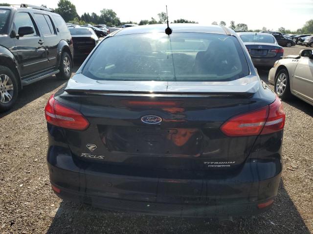 Photo 6 from auction – 2016 FORD FOCUS TITA with VIN 1FADP3J27GL297328