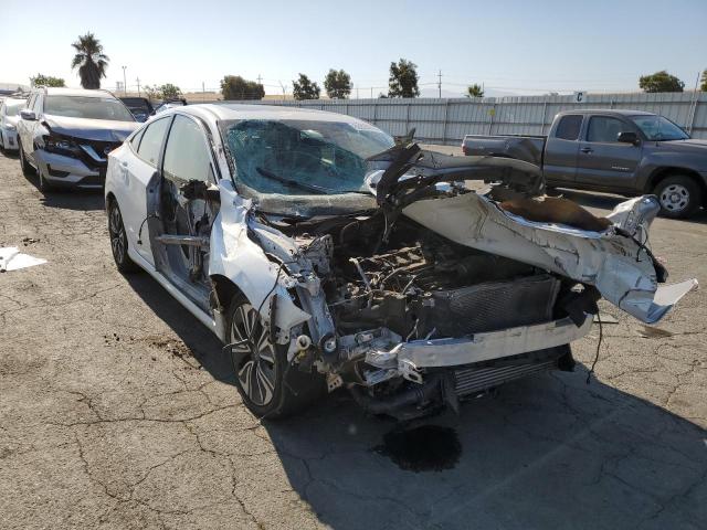 Photo 4 from auction – 2018 HONDA CIVIC EX with VIN JHMFC1F39JX004130