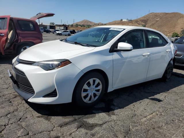 TOYOTA COROLLA L 2017 with VIN 5YFBURHE9HP693461 - Photo from auction