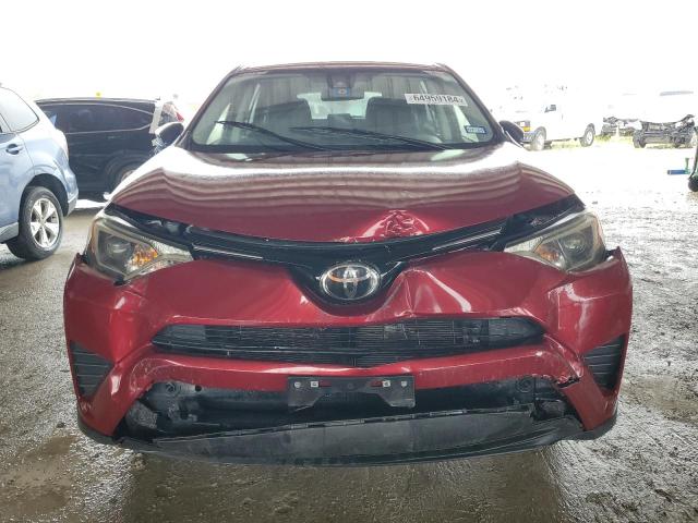 Photo 5 from auction – 2018 TOYOTA RAV4 LE with VIN JTMBFREV2JD229290