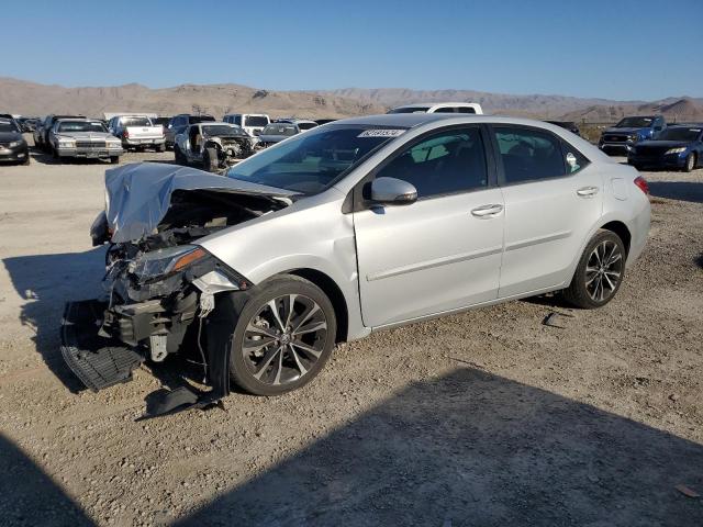 TOYOTA COROLLA L 2018 with VIN 2T1BURHEXJC982435 - Photo from auction