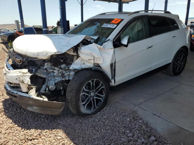CADILLAC SRX PERFOR 2012 with VIN 3GYFNBE37CS557554 - Photo from auction