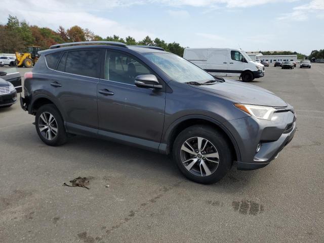 Photo 4 from auction – 2017 TOYOTA RAV4 XLE with VIN JTMRFREV9HJ706727