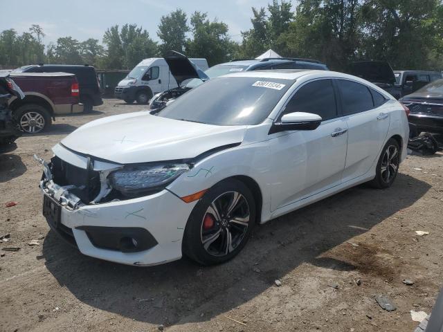 Photo 1 from auction – 2018 HONDA CIVIC TOUR with VIN JHMFC1F96JX042144