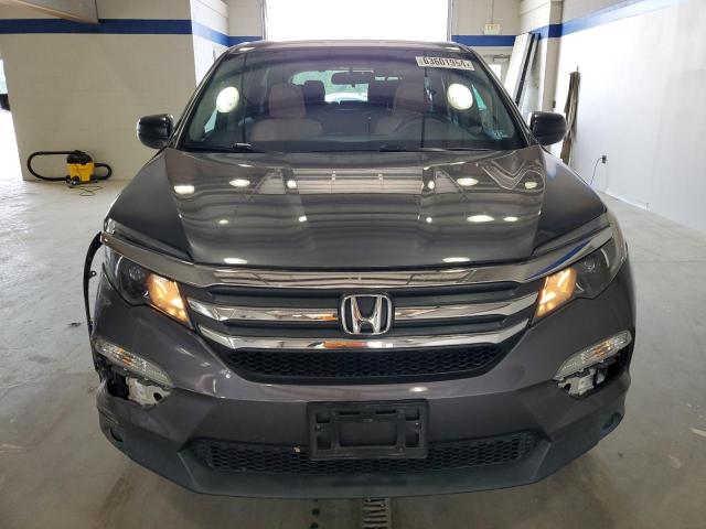 Photo 5 from auction – 2018 HONDA PILOT LX with VIN 5FNYF6H14JB044121