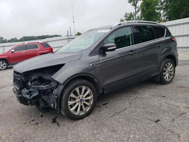 FORD ESCAPE TIT 2017 with VIN 1FMCU0J9XHUF09687 - Photo from auction