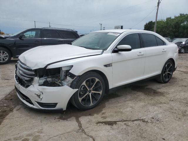 FORD TAURUS SEL 2014 with VIN 1FAHP2E85EG137528 - Photo from auction