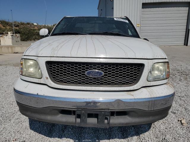 Photo 5 from auction – 2003 FORD F-150 with VIN 2FTRX17253CA55377