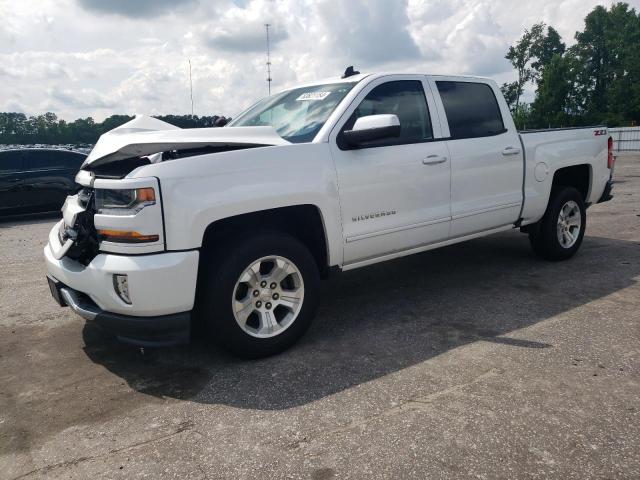 CHEVROLET SILVERADO 2018 with VIN 3GCUKREC5JG195593 - Photo from auction