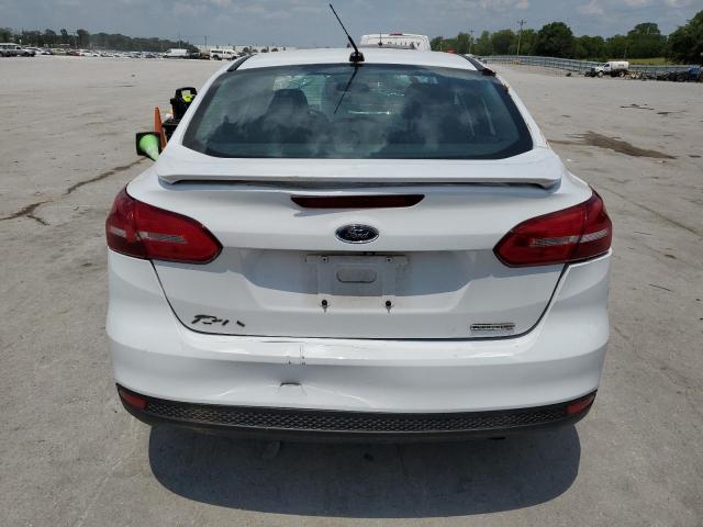 Photo 6 from auction – 2016 FORD FOCUS S with VIN 1FADP3E25GL266248