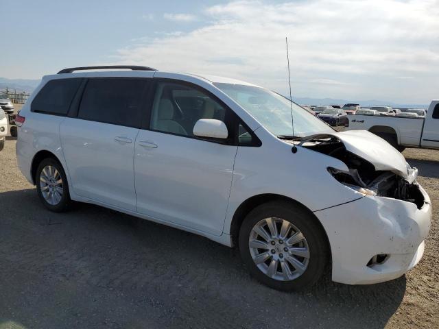 Photo 4 from auction – 2014 TOYOTA SIENNA LE with VIN 5TDJK3DC3ES093802