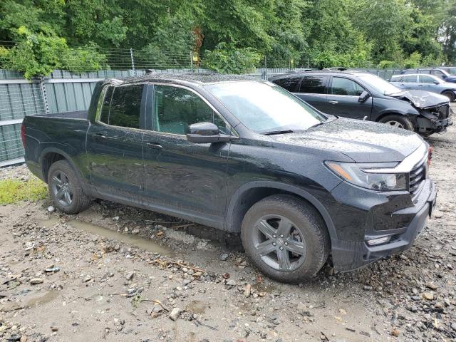 Photo 4 from auction – 2023 HONDA RIDGELINE with VIN 5FPYK3F52PB026443