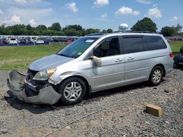 HONDA ODYSSEY EX 2010 with VIN 5FNRL3H77AB026941 - Photo from auction