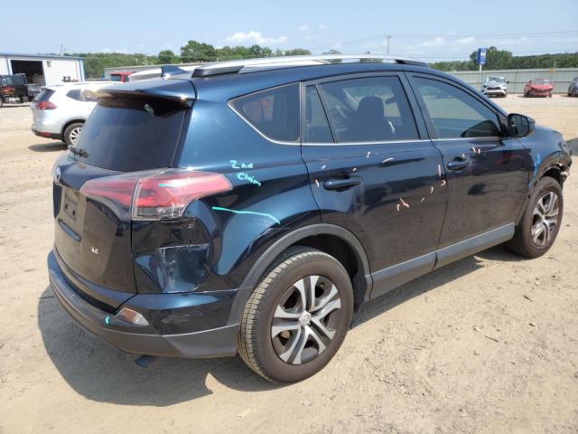 Photo 3 from auction – 2018 TOYOTA RAV4 LE with VIN JTMZFREV9JJ186129