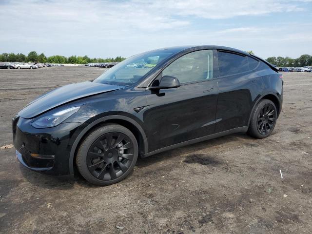 TESLA Y 2023 with VIN 7SAYGDEE5PF835763 - Photo from auction