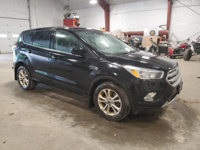 Photo 4 from auction – 2017 FORD ESCAPE SE with VIN 1FMCU9GD1HUC16440