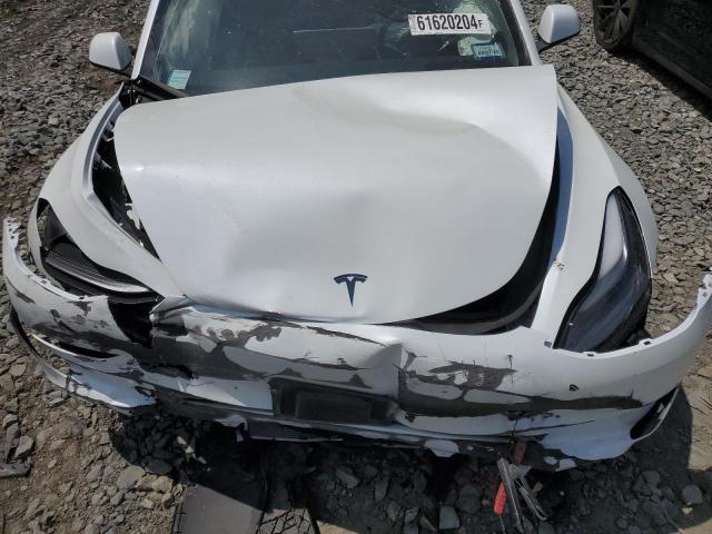 Photo 11 from auction – 2023 TESLA MODEL 3 with VIN 5YJ3E1EA5PF426090