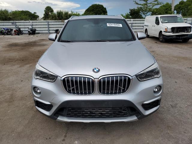 Photo 5 from auction – 2017 BMW X1 XDRIVE2 with VIN WBXHT3C37H5F78943