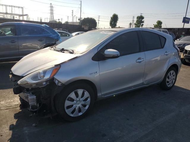 TOYOTA PRIUS C 2015 with VIN JTDKDTB39F1110330 - Photo from auction