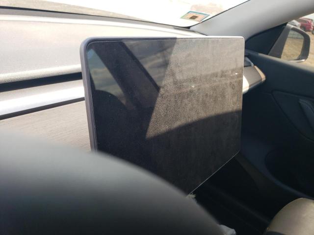 Photo 9 from auction – 2021 TESLA MODEL Y with VIN 5YJYGDED0MF125878