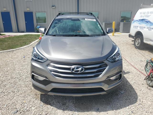 Photo 5 from auction – 2017 HYUNDAI SANTA FE S with VIN 5NMZU3LB0HH020271