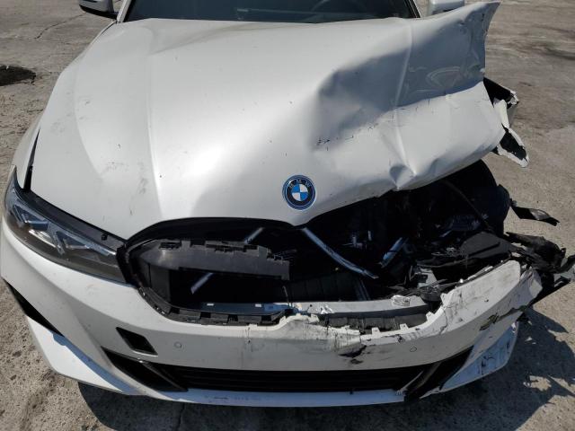 Photo 11 from auction – 2023 BMW 330E with VIN 3MW39FF00P8D10420