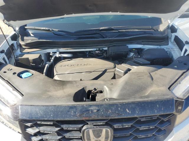 Photo 11 from auction – 2023 HONDA PASSPORT E with VIN 5FNYF8H00PB000337
