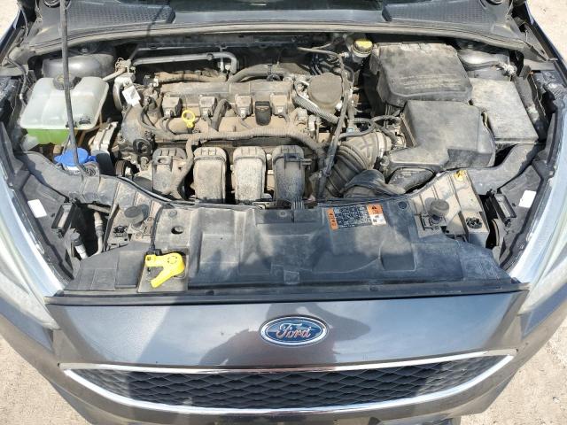 Photo 11 from auction – 2015 FORD FOCUS SE with VIN 1FADP3F24FL323911