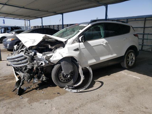 FORD ESCAPE SE 2018 with VIN 1FMCU0GD7JUA10105 - Photo from auction