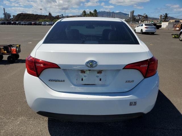 Photo 6 from auction – 2018 TOYOTA COROLLA L with VIN 5YFBURHEXJP826668