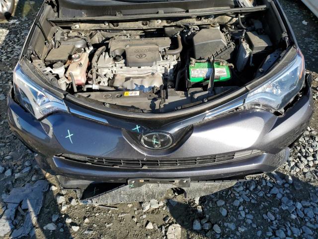 Photo 12 from auction – 2018 TOYOTA RAV4 LE with VIN JTMBFREV5JJ719286