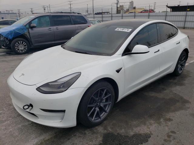 TESLA MODEL 3 2022 with VIN 5YJ3E1EB8NF211406 - Photo from auction